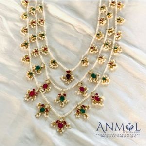 3 Line Pearl With Splash Of Color Kundan Pieces.